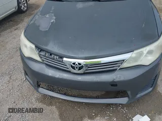 2014 Toyota Camry L with VIN 4T1BF1FK1EU771679, listed as a IAAI auction lot 42090764 with 216,362 mi miles and . Bid and sale history available at DreamBid. Image 6.