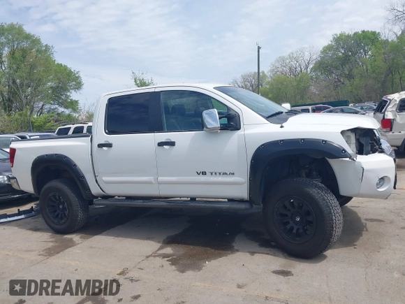 2005 Nissan Titan LE with VIN 1N6AA07BX5N525048, listed as a IAAI auction lot 41984150 with 242,321 mi miles. Bid and sale history available at carsss.com. Image 14.