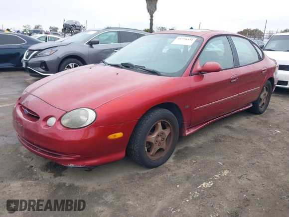 1997 Ford Taurus z VIN 1FALP54N7VA137035, wystawiony jako IAAI lot #41778551 z przebiegiem 137 025 mil mil oraz . Historia ofert i sprzedaży dostępna na DreamBid. Obrazek 2.