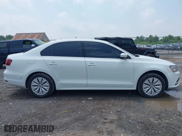 2017 Volkswagen Jetta S with VIN 3VW2B7AJ5HM291068, listed as a IAAI auction lot 42479310 with 160,221 mi miles and . Bid and sale history available at DreamBid. Image 14.