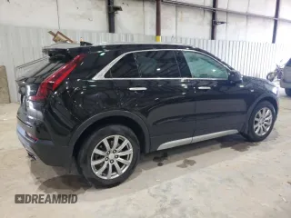 2020 Cadillac XT4 FWD Premium Luxury z VIN 1GYFZCR41LF143039, wystawiony jako Copart lot #57164005 z przebiegiem 24 218 mil mil oraz Nie do naprawy • Non repairable. Historia ofert i sprzedaży dostępna na DreamBid. Obrazek 3.
