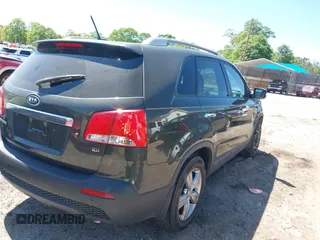2013 Kia Sorento EX with VIN 5XYKU4A67DG331097, listed as a IAAI auction lot 42058818 with 173,120 mi miles. Bid and sale history available at carsss.com. Image 4.