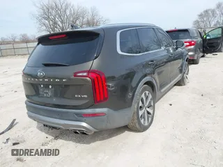 2021 Kia Telluride EX with VIN 5XYP34HC0MG162318, listed as a IAAI auction lot 41837489 with 110,922 mi miles and . Bid and sale history available at DreamBid. Image 4.