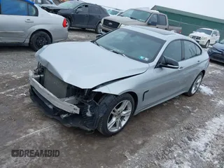 2016 BMW 4 Series 428i xDrive with VIN WBA4C9C53GG136870, listed as a IAAI auction lot 41410071 with 116,187 mi miles and . Bid and sale history available at DreamBid. Image 18.