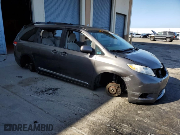 2013 Toyota Sienna LE AAS with VIN 5TDKK3DC0DS404489, listed as a Copart auction lot 56990105 with Not provided miles and Salvage title. Bid and sale history available at DreamBid. Image 4.