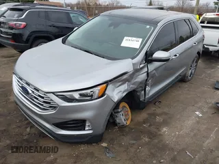 2021 Ford Edge Titanium z VIN 2FMPK4K94MBA32297, wystawiony jako IAAI lot #41834740 z przebiegiem 45 908 mil mil oraz . Historia ofert i sprzedaży dostępna na DreamBid. Obrazek 17.