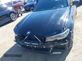 2021 BMW 3 Series M340i xDrive with VIN 3MW5U9J0XM8B49022, listed as a IAAI auction lot 41637152 with 65,452 mi miles. Bid and sale history available at carsss.com. Image 6.