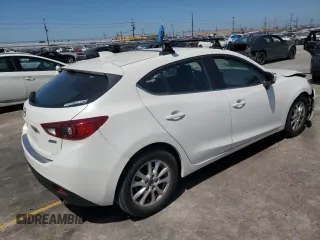 2015 Mazda 3 i Touring with VIN 3MZBM1L74FM178525, listed as a Copart auction lot 57079635 with 88,730 mi miles and Salvage title. Bid and sale history available at DreamBid. Image 3.