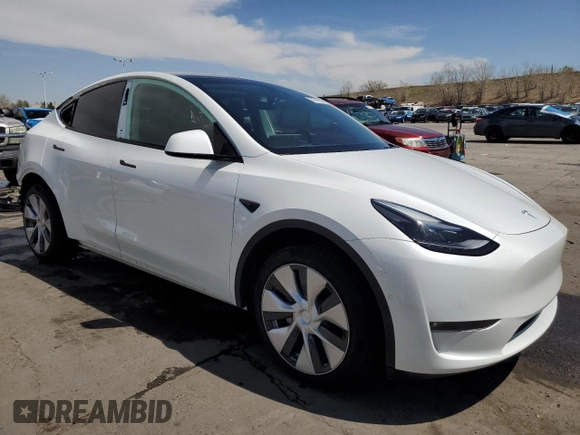 2022 Tesla Model Y Long Range with VIN 7SAYGAEE4NF534588, listed as a Copart auction lot 53274995 with 20,768 mi miles and Salvage Title. Bid and sale history available at DreamBid. Image 4.