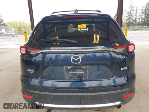 2018 Mazda CX-9 Grand Touring with VIN JM3TCBDY0J0216195, listed as a IAAI auction lot 41976122 with 90,083 mi miles and . Bid and sale history available at DreamBid. Image 16.
