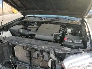 2021 Toyota Tacoma SR z VIN 3TMCZ5AN0MM390739, wystawiony jako Copart lot #86069285 z przebiegiem 55 638 mil mil oraz Szkoda całkowita • Salvage title. Historia ofert i sprzedaży dostępna na DreamBid. Obrazek 13.