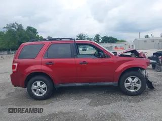 2012 Ford Escape XLT with VIN 1FMCU0D71CKC62929, listed as a IAAI auction lot 42523879 with 143,533 mi miles and . Bid and sale history available at DreamBid. Image 14.