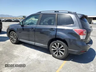 2017 Subaru Forester Touring with VIN JF2SJGWC1HH476823, listed as a Copart auction lot 59230835 with 107,711 mi miles and Salvage title. Bid and sale history available at DreamBid. Image 2.
