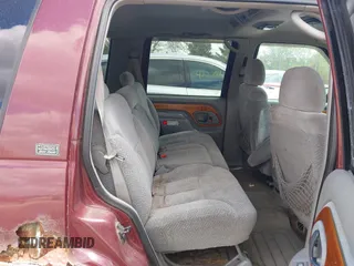1999 Chevrolet Tahoe Z71 z VIN 1GNEK13R7XJ444925, wystawiony jako IAAI lot #42261246 z przebiegiem 183 530 mil mil oraz . Historia ofert i sprzedaży dostępna na DreamBid. Obrazek 8.