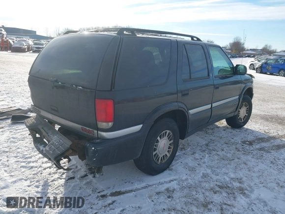1999 GMC Jimmy SLE with VIN 1GKDT13W5X2520020, listed as a IAAI auction lot 41337936 with 277,615 mi miles. Bid and sale history available at carsss.com. Image 4.