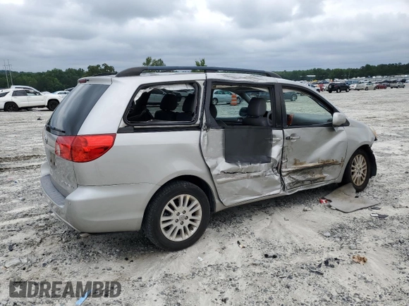 2010 Toyota Sienna XLE with VIN 5TDYK4CC1AS322395, listed as a Copart auction lot 60520215 with 148,725 mi miles and Salvage title. Bid and sale history available at DreamBid. Image 3.