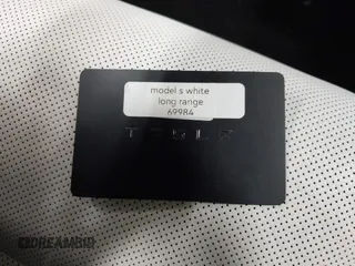 2022 Tesla Model S with VIN 5YJSA1E59NF469984, listed as a IAAI auction lot 42426490 with Not provided miles and . Bid and sale history available at DreamBid. Image 9.