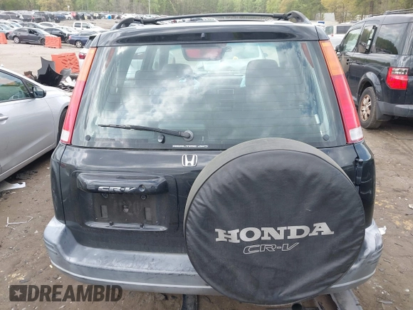1999 Honda CR-V EX with VIN JHLRD1866XC055610, listed as a IAAI auction lot 41953453 with 152,557 mi miles. Bid and sale history available at carsss.com. Image 15.
