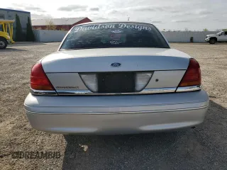 2003 Ford Crown Victoria LX z VIN 2FAFP74W03X122995, wystawiony jako Copart lot #55774415 z przebiegiem 234 485 mil mil oraz Czysty tytuł • Clean title. Historia ofert i sprzedaży dostępna na DreamBid. Obrazek 6.