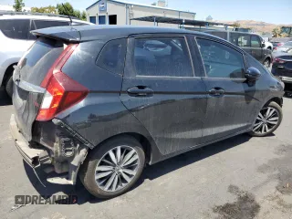 2018 Honda Fit EX with VIN 3HGGK5H86JM718717, listed as a Copart auction lot 63777545 with 88,669 mi miles and Salvage title. Bid and sale history available at DreamBid. Image 3.