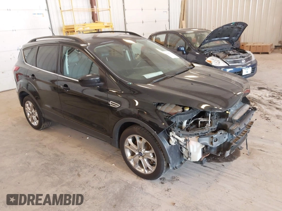 2014 Ford Escape SE with VIN 1FMCU9G95EUA16328, listed as a IAAI auction lot 42464235 with 108,570 mi miles and . Bid and sale history available at DreamBid. Image 1.