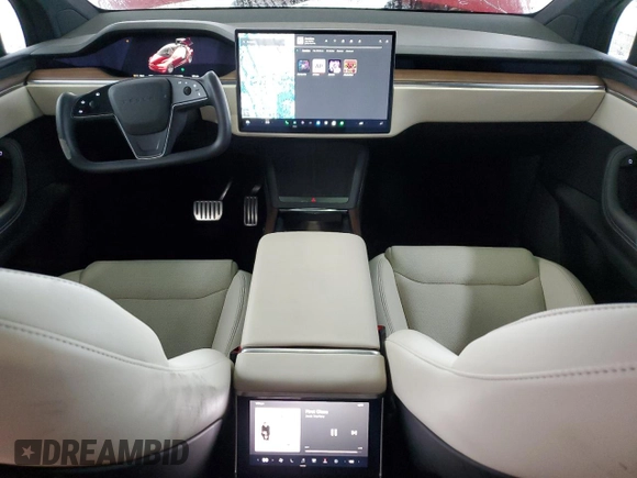 2023 Tesla Model X with VIN 7SAXCBE52PF365140, listed as a Copart auction lot 44564965 with 27,107 mi miles and Salvage Title. Bid and sale history available at DreamBid. Image 8.