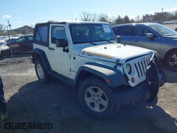 2010 Jeep Wrangler Sport with VIN 1J4GA2D11AL161770, listed as a IAAI auction lot 41875929 with 164,954 mi miles and . Bid and sale history available at carsss.com. Image 1.