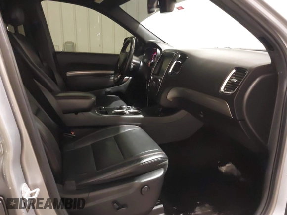 2014 Dodge Durango R/T with VIN 1C4SDJCTXEC558937, listed as a IAAI auction lot 41570244 with 174,724 mi miles and . Bid and sale history available at DreamBid. Image 5.