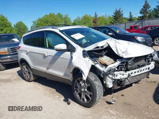 2015 Ford Escape Titanium z VIN 1FMCU9J9XFUA35967, wystawiony jako IAAI lot #42342432 z przebiegiem 160 442 mil mil oraz . Historia ofert i sprzedaży dostępna na DreamBid. Obrazek 1.