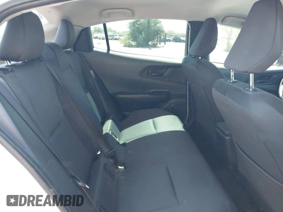 2024 Toyota Prius LE with VIN JTDACAAU5R3046244, listed as a IAAI auction lot 42464523 with 13,590 mi miles and . Bid and sale history available at DreamBid. Image 8.
