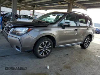 2018 Subaru Forester Touring with VIN JF2SJGWC0JH606547, listed as a Copart auction lot 46926865 with 31,721 mi miles and Salvage Title. Bid and sale history available at carsss.com. Image 1.