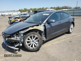 2023 Tesla Model 3 Long Range with VIN 5YJ3E1EB2PF389041, listed as a Copart auction lot 53450725 with 27,060 mi miles and Salvage Title. Bid and sale history available at DreamBid. Image 1.