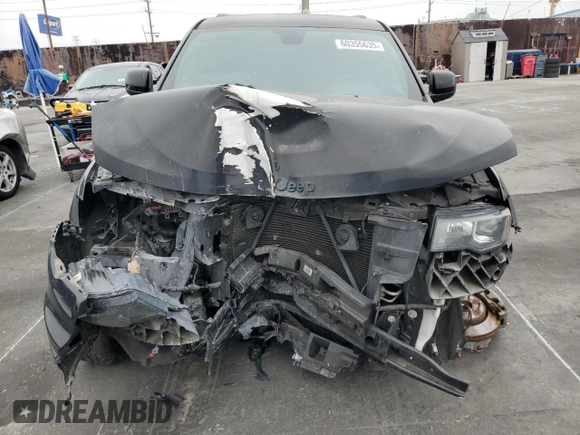 2018 Jeep Grand Cherokee Altitude with VIN 1C4RJEAG3JC149502, listed as a Copart auction lot 60355635 with 69,769 mi miles and Salvage title. Bid and sale history available at DreamBid. Image 5.