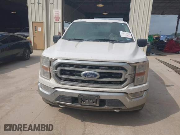 2021 Ford F-150 XL with VIN 1FTEW1EP1MKD07980, listed as a IAAI auction lot 42074902 with 170,631 mi miles. Bid and sale history available at carsss.com. Image 12.