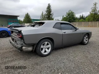 2012 Dodge Challenger SXT Plus z VIN 2C3CDYAG1CH254512, wystawiony jako Copart lot #59034895 z przebiegiem 152 597 mil mil oraz Szkoda całkowita • Salvage title. Historia ofert i sprzedaży dostępna na DreamBid. Obrazek 3.
