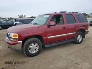 2001 GMC Yukon SLT z VIN 1GKEC13T21J302687, wystawiony jako Copart lot #80982344 z przebiegiem 139 565 mil mil oraz Szkoda całkowita • Salvage title. Historia ofert i sprzedaży dostępna na DreamBid. Obrazek 1.