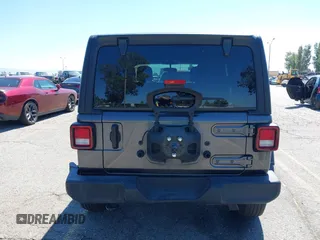 2022 Jeep Wrangler Unlimited Sport S z VIN 1C4HJXDG6NW134306, wystawiony jako IAAI lot #42206796 z przebiegiem 45 303 mil mil oraz . Historia ofert i sprzedaży dostępna na DreamBid. Obrazek 16.