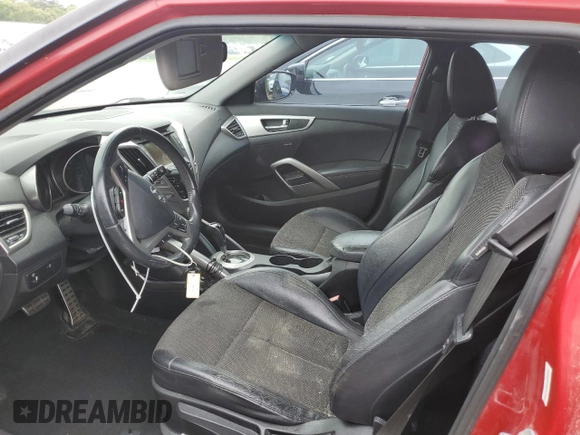 2013 Hyundai Veloster w/Black Int with VIN KMHTC6AD9DU086296, listed as a Copart auction lot 49581285 with 122,637 mi miles and Salvage Title. Bid and sale history available at carsss.com. Image 7.