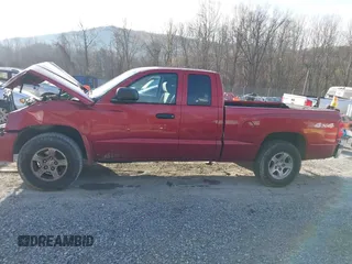 2006 Dodge Dakota SLT with VIN 1D7HW42N16S525329, listed as a IAAI auction lot 40920101 with 124,535 mi miles and . Bid and sale history available at carsss.com. Image 14.