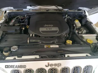 2015 Jeep Wrangler Unlimited Wrangler X with VIN 1C4HJWEG7FL671259, listed as a Copart auction lot 52334325 with 81,244 mi miles and Clean title. Bid and sale history available at DreamBid. Image 12.