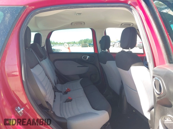 2014 FIAT 500L Easy with VIN ZFBCFABH7EZ027657, listed as a IAAI auction lot 40808990 with 107,591 mi miles and . Bid and sale history available at DreamBid. Image 8.