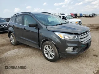 2018 Ford Escape SE with VIN 1FMCU0G90JUB62738, listed as a Copart auction lot 63380654 with 157,762 mi miles and Salvage Title. Bid and sale history available at carsss.com. Image 4.