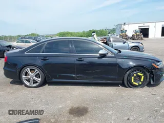2014 Audi S6 Prestige z VIN WAUF2AFC9EN058417, wystawiony jako IAAI lot #42236333 z przebiegiem 58 257 mil mil oraz . Historia ofert i sprzedaży dostępna na DreamBid. Obrazek 14.