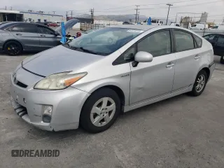 2010 Toyota Prius II z VIN JTDKN3DUXA0216688, wystawiony jako Copart lot #54551815 z przebiegiem 223 746 mil mil oraz Czysty tytuł • Clean title. Historia ofert i sprzedaży dostępna na DreamBid. Obrazek 1.