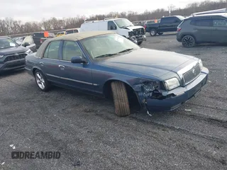 2007 Mercury Grand Marquis LS Premium z VIN 2MEFM75WX7X600118, wystawiony jako IAAI lot #41773629 z przebiegiem 174 009 mil mil oraz . Historia ofert i sprzedaży dostępna na DreamBid. Obrazek 1.