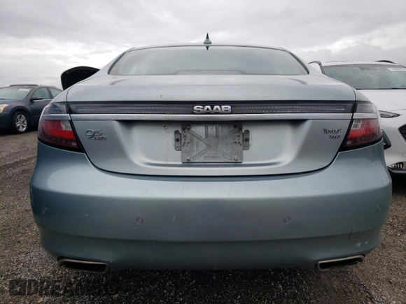 2011 Saab 9-5 Aero XWD with VIN YS3GR4BJ7B4002446, listed as a Copart auction lot 74962954 with 0 mi miles and Salvage Title. Bid and sale history available at carsss.com. Image 6.