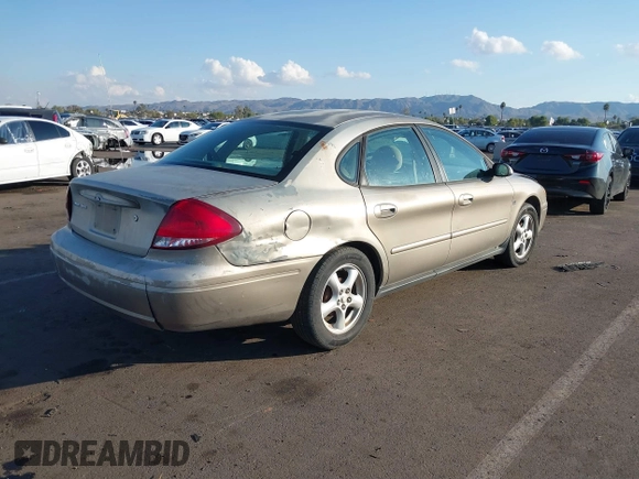 2004 Ford Taurus SES with VIN 1FAFP55S74A116833, listed as a IAAI auction lot 39086934 with Not provided miles and . Bid and sale history available at DreamBid. Image 4.