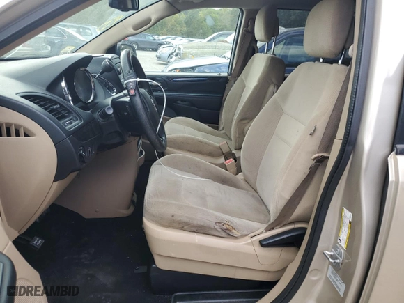 2015 Dodge Grand Caravan American Value Pkg with VIN 2C4RDGBG1FR641199, listed as a Copart auction lot 73400114 with 112,831 mi miles and Clean Title. Bid and sale history available at carsss.com. Image 7.