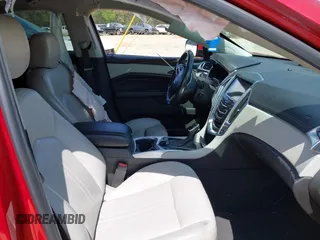 2015 Cadillac SRX Luxury Collection with VIN 3GYFNEE39FS585667, listed as a IAAI auction lot 41966416 with 156,246 mi miles. Bid and sale history available at carsss.com. Image 5.