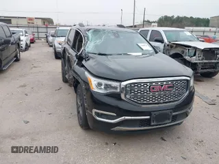2017 GMC Acadia Denali with VIN 1GKKNPLSXHZ323869, listed as a IAAI auction lot 41600828 with 131,676 mi miles. Bid and sale history available at carsss.com. Image 1.